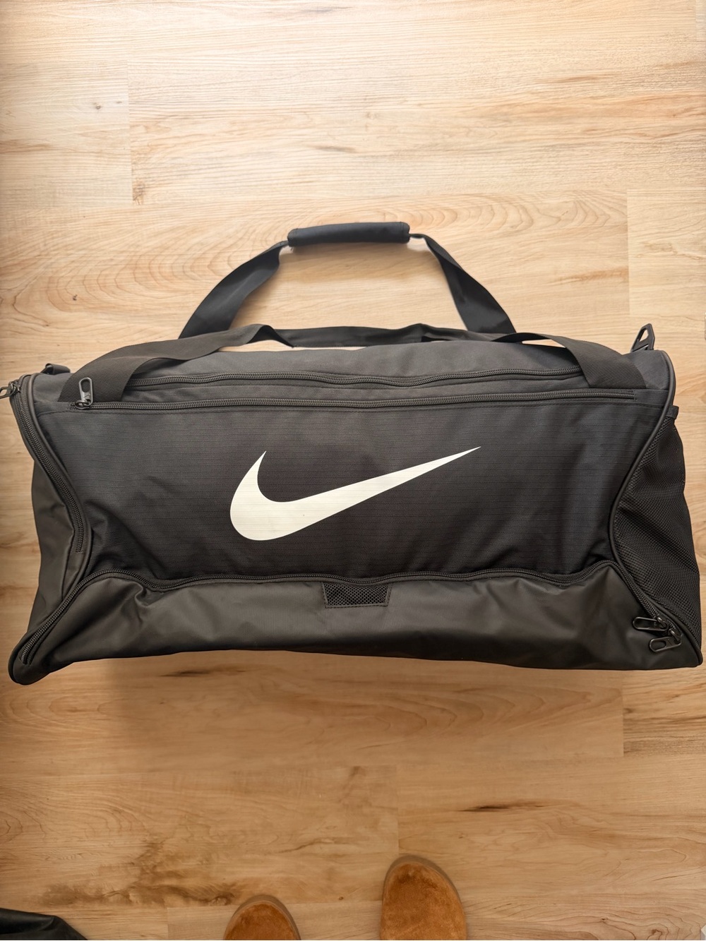 Nike Black Duffel Bag with White Swoosh Logo